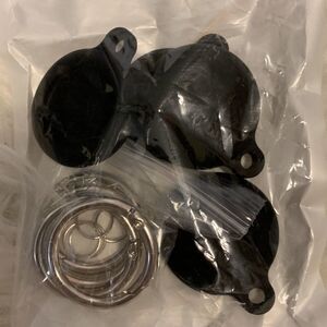 Four pack of AirTag holders case black. Includes key ring